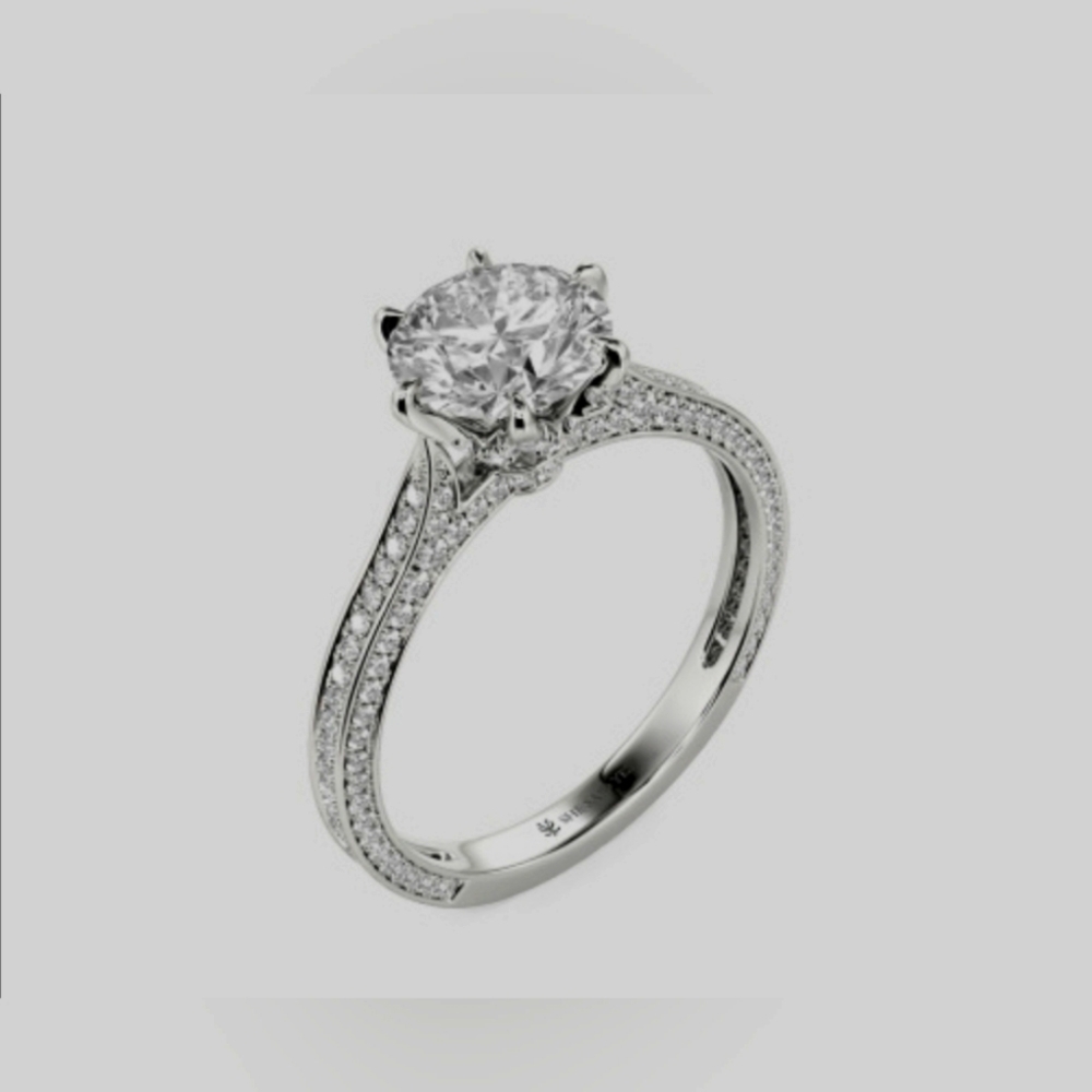 Round-cut side stone Engagement Ring